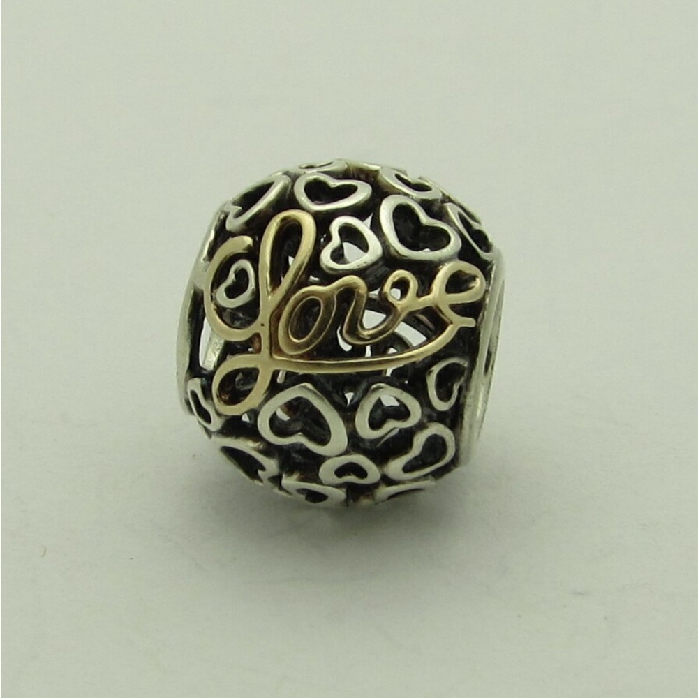 Authentic Pandora “love” heart charm